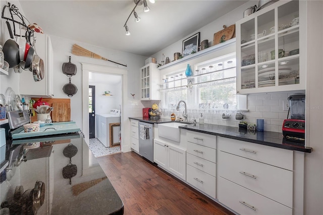 917 W Idlewild Ave, Tampa, FL 33604 - kitchen featuring washer / clothes dryer, dishwasher, decorative backsplash, white cabinetry, and glass insert cabinets
