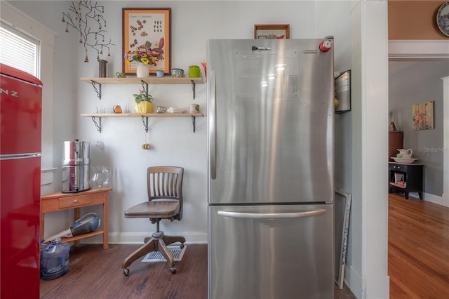 917 W Idlewild Ave, Tampa, FL 33604 - kitchen with freestanding refrigerator, wood finished floors, fridge, and open shelves