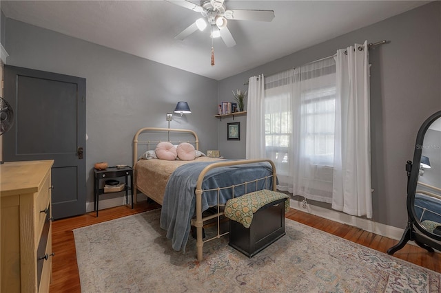 917 W Idlewild Ave, Tampa, FL 33604 - bedroom with wood finished floors and a ceiling fan
