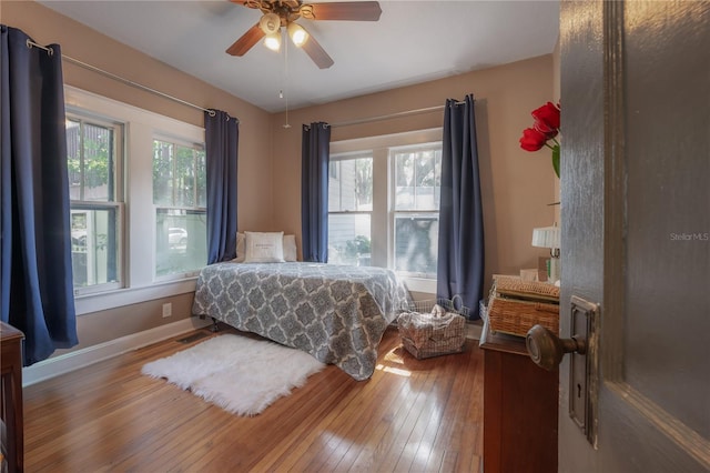917 W Idlewild Ave, Tampa, FL 33604 - bedroom with hardwood / wood-style flooring and ceiling fan