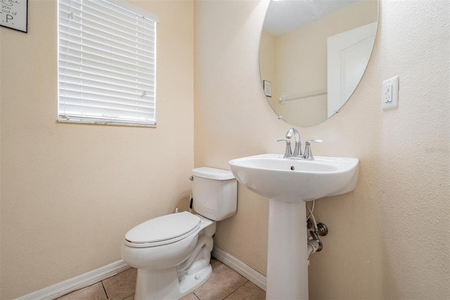 15420 Quail Woods Pl, Ruskin, FL 33573 - half bathroom featuring tile patterned floors and toilet