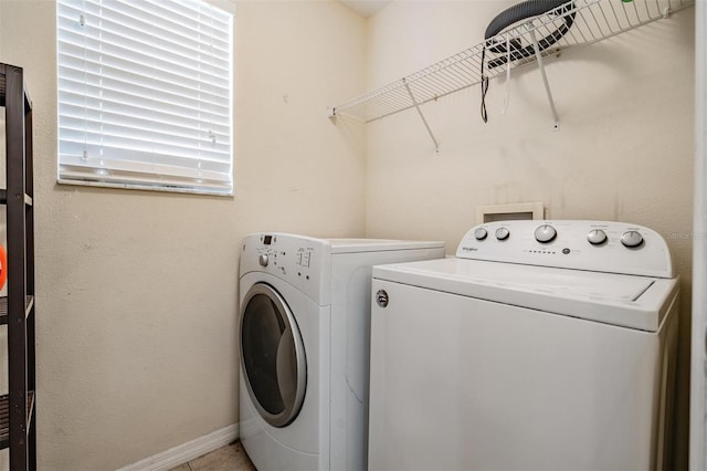 15420 Quail Woods Pl, Ruskin, FL 33573 - washroom with washer and clothes dryer and baseboards
