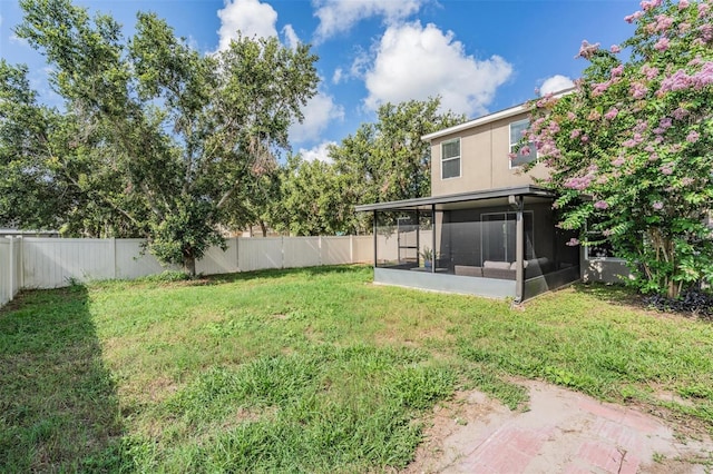 15420 Quail Woods Pl, Ruskin, FL 33573 - fenced backyard featuring a sunroom