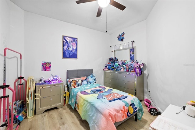 9831 Edmonton Dr, Land O Lakes, FL 34638 - bedroom featuring wood finished floors and ceiling fan