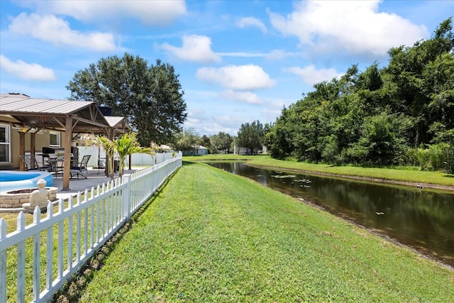 9831 Edmonton Dr, Land O Lakes, FL 34638 - view of yard with a patio and a water view