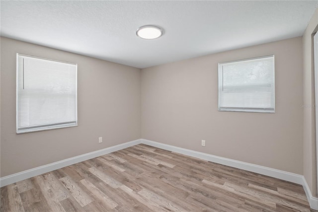 561 Golf And Sea Blvd, Apollo Beach, FL 33572 - empty room featuring wood finished floors