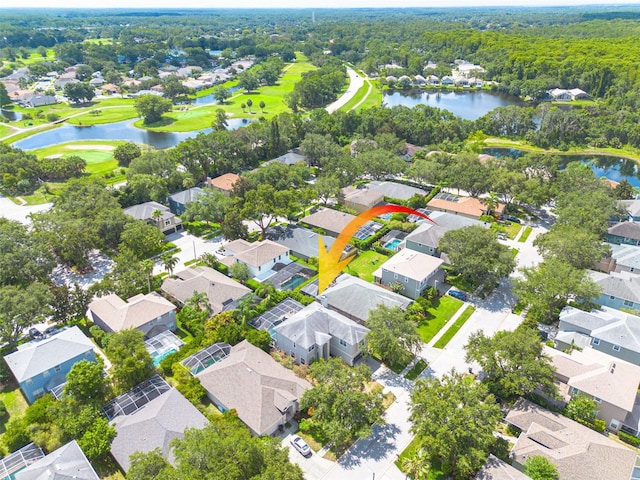 4147 Grandchamp Cir, Palm Harbor, FL 34685 - aerial view of residential area with a large body of water and a golf club