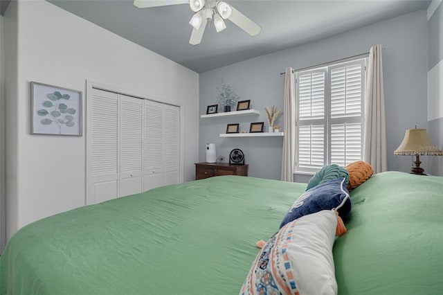 4147 Grandchamp Cir, Palm Harbor, FL 34685 - bedroom with a closet and ceiling fan