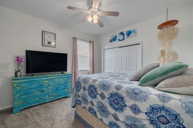 4147 Grandchamp Cir, Palm Harbor, FL 34685 - bedroom featuring carpet flooring, a closet, and a ceiling fan