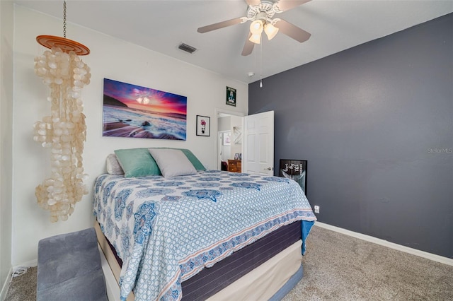 4147 Grandchamp Cir, Palm Harbor, FL 34685 - bedroom with carpet flooring and a ceiling fan
