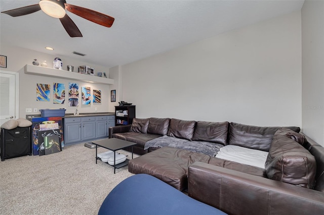 4147 Grandchamp Cir, Palm Harbor, FL 34685 - living area with a ceiling fan, light colored carpet, and recessed lighting