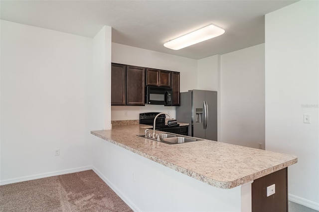12841 Buffalo Run Dr, Gibsonton, FL 33534 - kitchen featuring stainless steel refrigerator with ice dispenser, black microwave, light countertops, dark brown cabinetry, and carpet floors