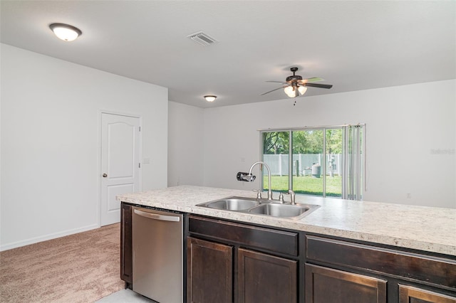 12841 Buffalo Run Dr, Gibsonton, FL 33534 - kitchen with dishwasher, light countertops, ceiling fan, and dark brown cabinetry