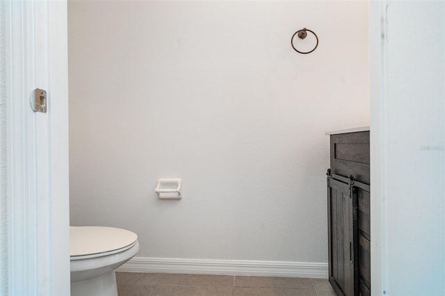 12841 Buffalo Run Dr, Gibsonton, FL 33534 - bathroom with toilet and tile patterned flooring