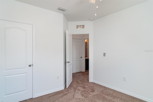 12841 Buffalo Run Dr, Gibsonton, FL 33534 - unfurnished bedroom featuring light carpet and baseboards