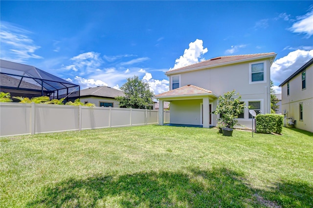 828 Terra Vista St, Brandon, FL 33511 - back of property featuring a tile roof and stucco siding