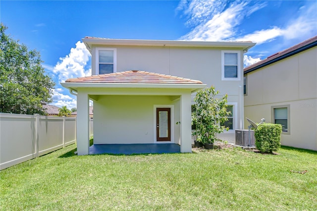 828 Terra Vista St, Brandon, FL 33511 - rear view of house featuring stucco siding and a tiled roof