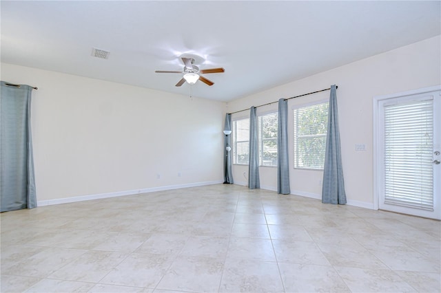 828 Terra Vista St, Brandon, FL 33511 - spare room featuring a ceiling fan and light tile patterned floors