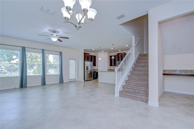 828 Terra Vista St, Brandon, FL 33511 - unfurnished living room featuring stairway, a ceiling fan, light tile patterned flooring, a chandelier, and recessed lighting