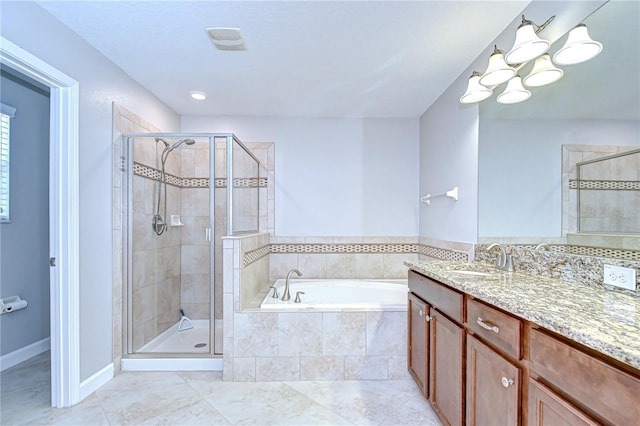 828 Terra Vista St, Brandon, FL 33511 - bathroom with a garden tub, a stall shower, vanity, and tile patterned flooring