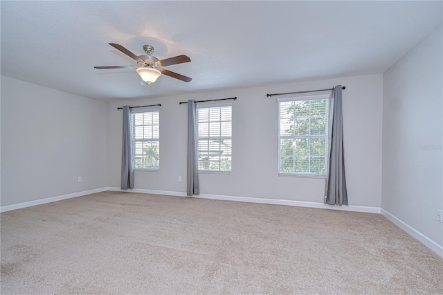 828 Terra Vista St, Brandon, FL 33511 - carpeted empty room with healthy amount of natural light and ceiling fan