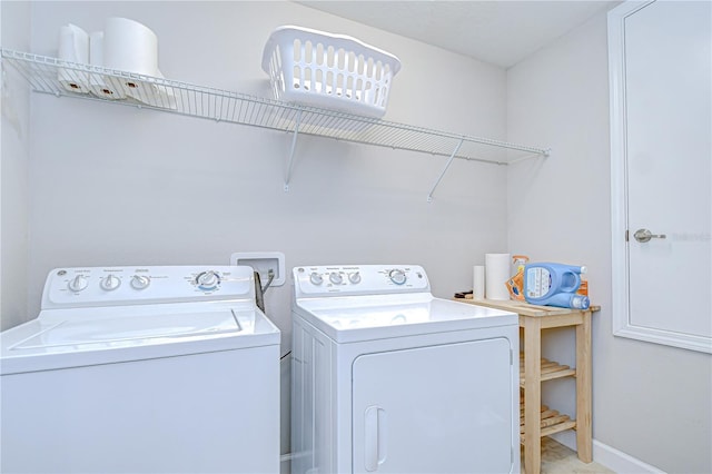 828 Terra Vista St, Brandon, FL 33511 - laundry room featuring separate washer and dryer and baseboards
