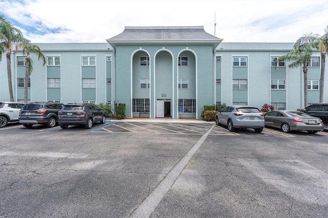 1706 Belleair Forest Dr Unit 146, Belleair, FL 33756 - view of property with uncovered parking