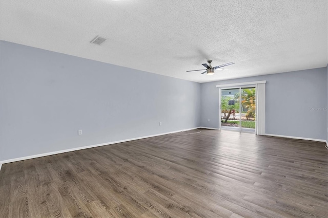 1706 Belleair Forest Dr Unit 146, Belleair, FL 33756 - spare room featuring ceiling fan, wood finished floors, and a textured ceiling