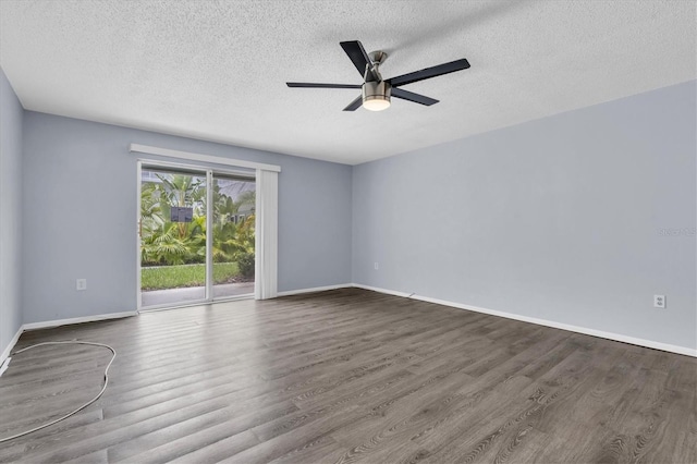1706 Belleair Forest Dr Unit 146, Belleair, FL 33756 - unfurnished room featuring wood finished floors, a textured ceiling, and ceiling fan