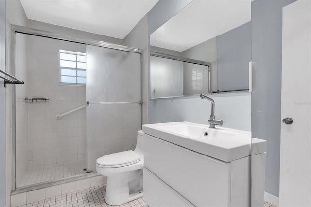 1706 Belleair Forest Dr Unit 146, Belleair, FL 33756 - bathroom featuring vanity, a stall shower, and tile patterned flooring