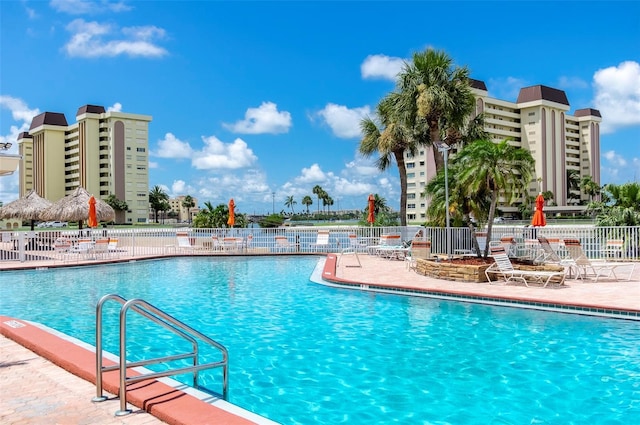 4775 Cove Cir Unit 803, Saint Petersburg, FL 33708 - community pool featuring a patio