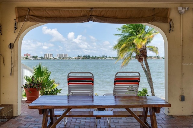 4775 Cove Cir Unit 803, Saint Petersburg, FL 33708 - view of patio / terrace featuring a water view