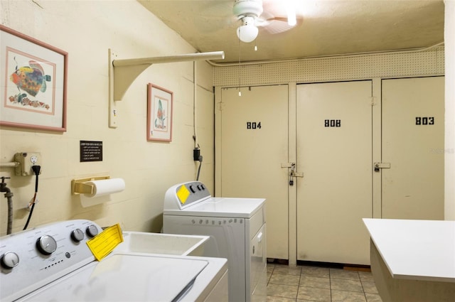4775 Cove Cir Unit 803, Saint Petersburg, FL 33708 - laundry area featuring washer and clothes dryer, a ceiling fan, and light tile patterned floors