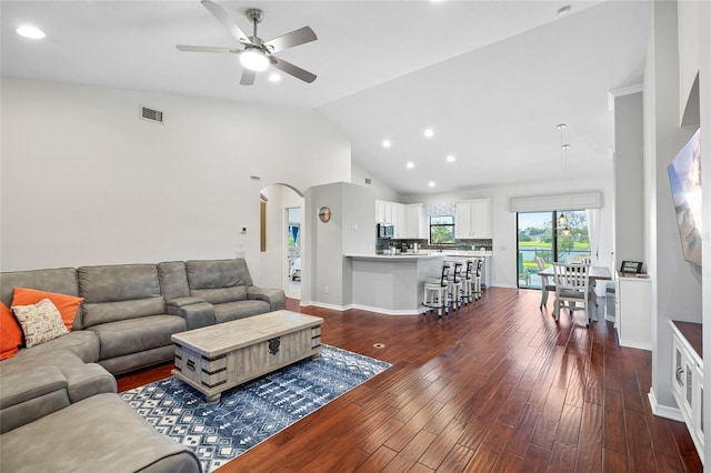 12830 24th Street Cir E, Parrish, FL 34219 - living area featuring ceiling fan, recessed lighting, arched walkways, dark wood finished floors, and high vaulted ceiling