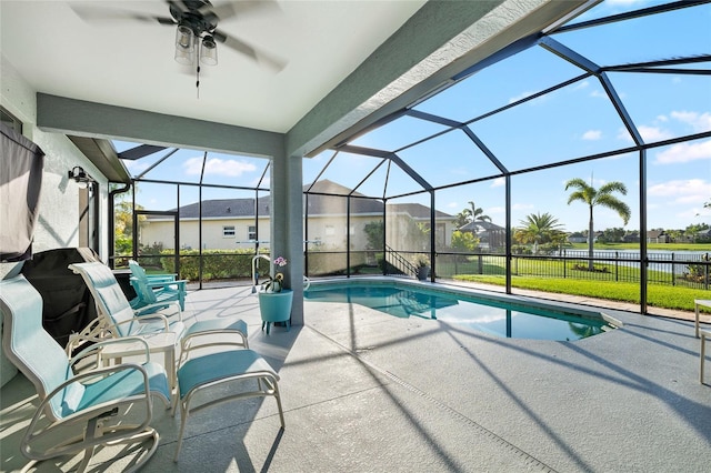 12830 24th Street Cir E, Parrish, FL 34219 - outdoor pool with a patio, ceiling fan, and glass enclosure