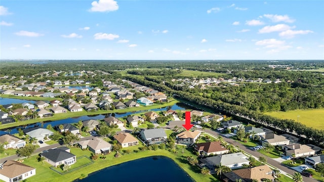 12830 24th Street Cir E, Parrish, FL 34219 - aerial view of property and surrounding area with nearby suburban area and a nearby body of water