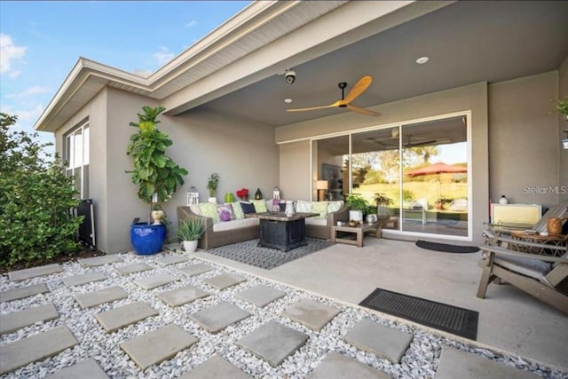 4906 Los Robles Ct, Palmetto, FL 34221 - view of patio / terrace with an outdoor living space and a ceiling fan