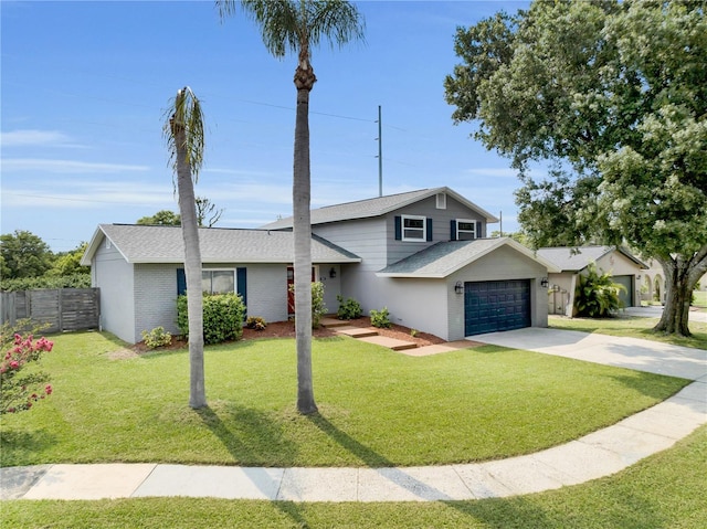 3721 Casaba Loop, Valrico, FL 33596 - split level home with an attached garage, driveway, brick siding, and a shingled roof