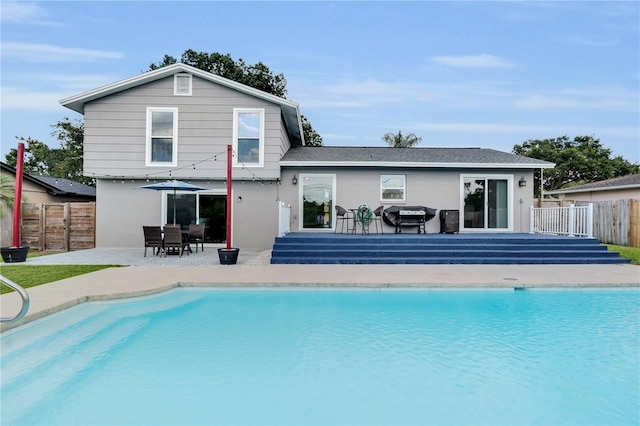 3721 Casaba Loop, Valrico, FL 33596 - rear view of property with a patio