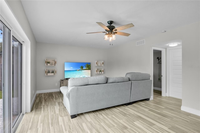3721 Casaba Loop, Valrico, FL 33596 - living room with light wood-type flooring and a ceiling fan