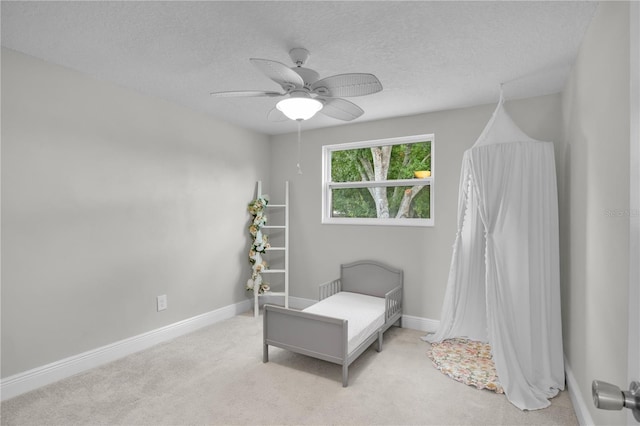 3721 Casaba Loop, Valrico, FL 33596 - bedroom with light colored carpet, a ceiling fan, and a textured ceiling