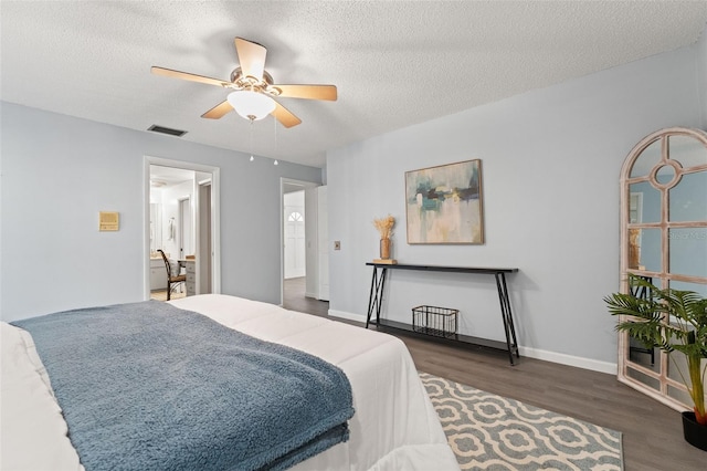 2708 W Bird St, Tampa, FL 33614 - bedroom featuring wood finished floors, a textured ceiling, and a ceiling fan