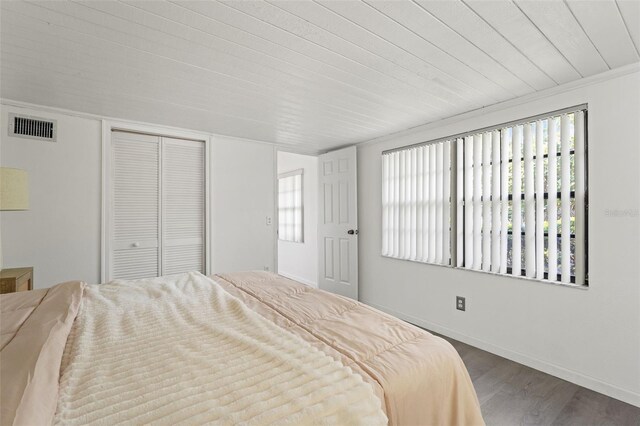 2708 W Bird St, Tampa, FL 33614 - bedroom with wood finished floors and a closet