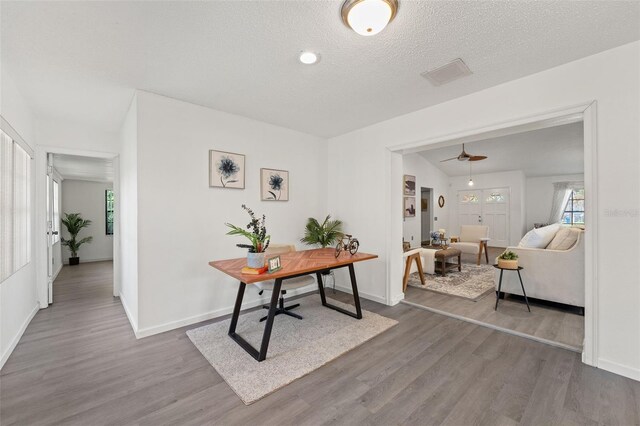 2708 W Bird St, Tampa, FL 33614 - office area featuring wood finished floors, a ceiling fan, and a textured ceiling