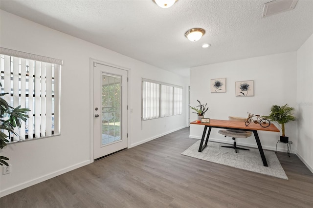 2708 W Bird St, Tampa, FL 33614 - office space with wood finished floors and a textured ceiling