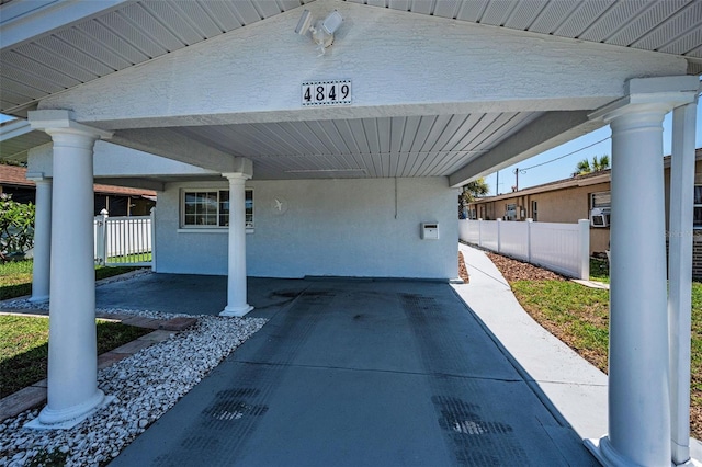 4849 Floramar Ter, New Port Richey, FL 34652 - view of patio / terrace with an attached carport