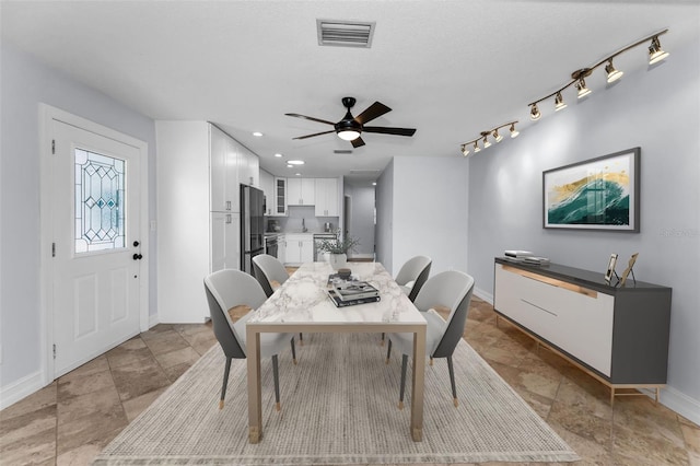 4849 Floramar Ter, New Port Richey, FL 34652 - dining space featuring ceiling fan, light stone finish floors, and recessed lighting