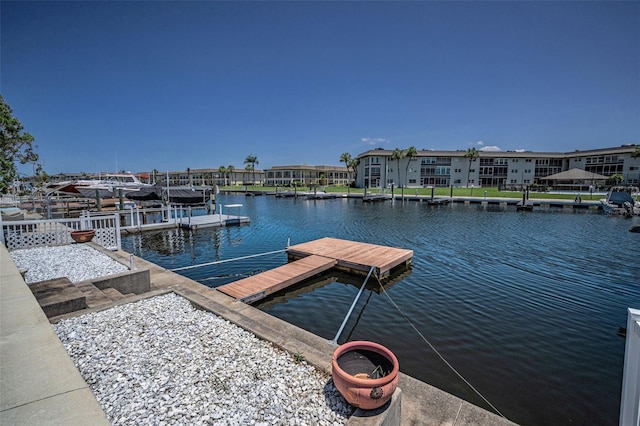4849 Floramar Ter, New Port Richey, FL 34652 - dock with a water view and a residential view