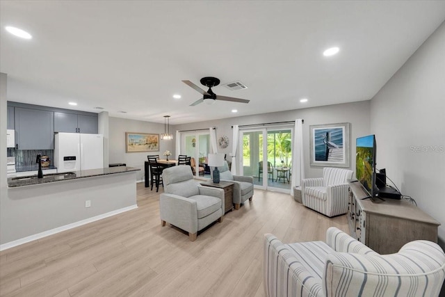 511 Foxglove Cir Unit B, Sun City Center, FL 33573 - living area with recessed lighting, light wood-style flooring, and a ceiling fan