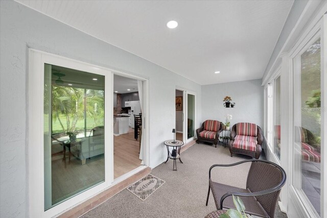 511 Foxglove Cir Unit B, Sun City Center, FL 33573 - sunroom / solarium featuring healthy amount of natural light, carpet flooring, and recessed lighting